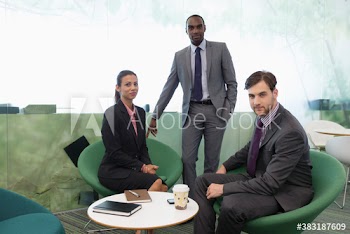 Portrait confident corporate business people in modern office meeting