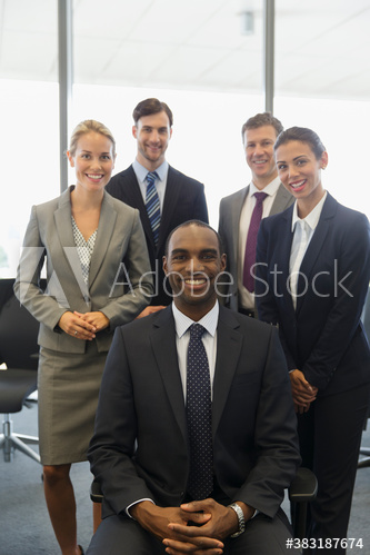 Portrait confident corporate business people in office