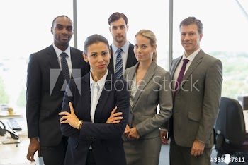Portrait confident corporate business people in office