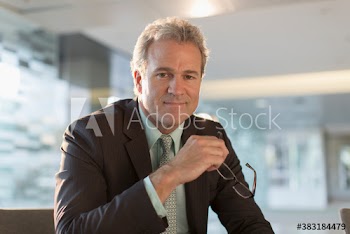 Portrait confident corporate businessman