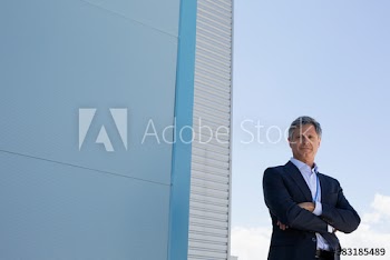 Portrait confident corporate businessman