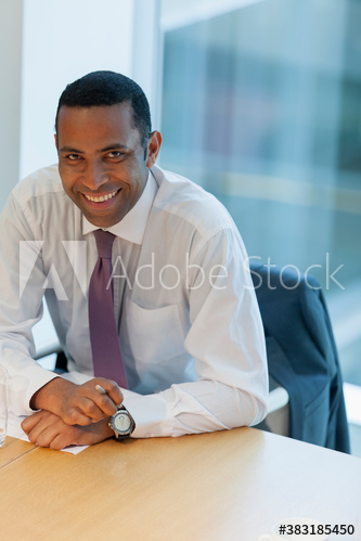 Portrait confident corporate businessman in office
