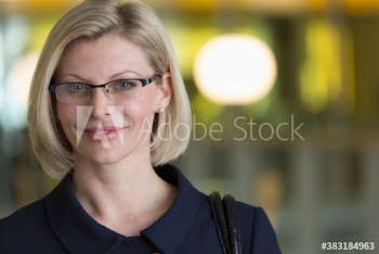 Portrait confident corporate businesswoman