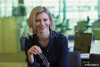 Portrait confident corporate businesswoman in office