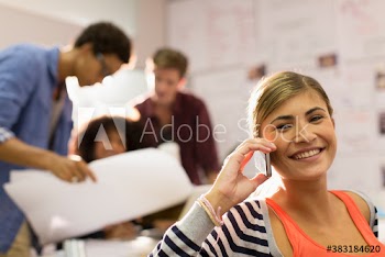 Portrait confident creative businesswoman talking on smart phone