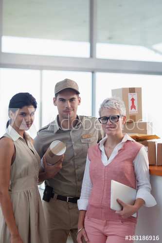 Portrait confident deliveryman and businesswomen