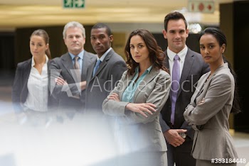Portrait confident diverse corporate business people