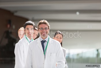 Portrait confident doctors in lab coats