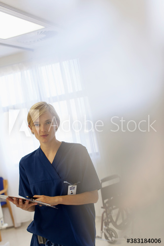 Portrait confident female nurse in hospital