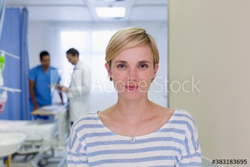 Portrait confident female patient in hospital