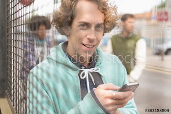Portrait confident man with smart phone