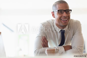 Portrait confident smiling young businessman