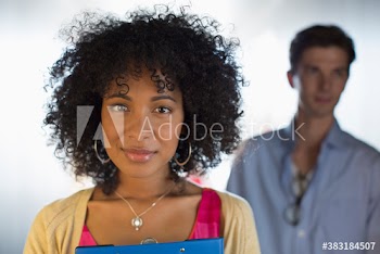 Portrait confident young businesswoman