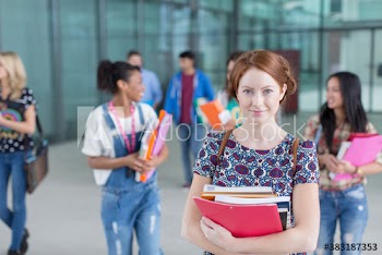 Portrait confident young female college student
