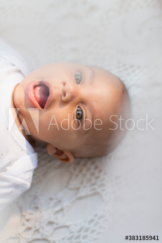 Portrait curious baby boy