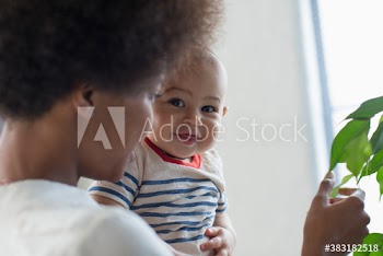 Portrait cute baby son with mother