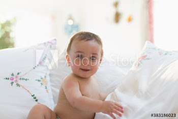 Portrait cute curious baby boy