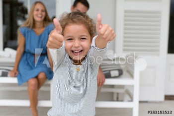 Portrait enthusiastic girl gesturing thumbs up