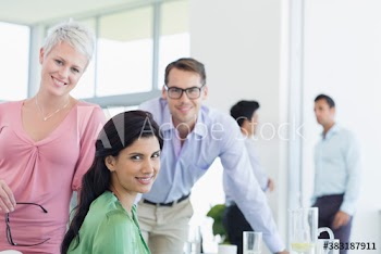 Portrait happy business people in meeting