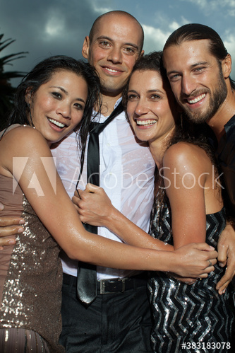 Portrait happy couples friends at party