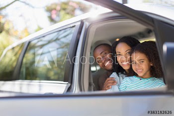 Portrait happy family inside car