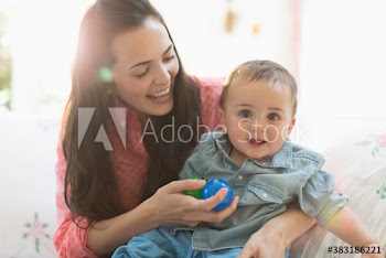 Portrait happy mother and baby son