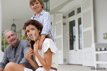 Portrait happy multi-generation family on patio