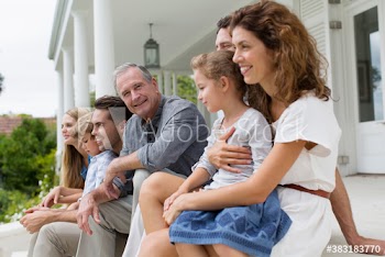 Portrait happy multi-generation family on patio