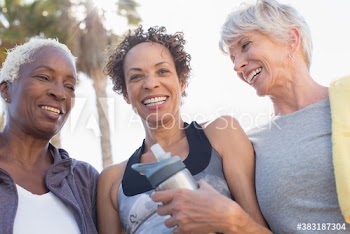 Portrait happy senior women exercising