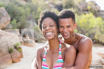 Portrait happy young couple on vacation