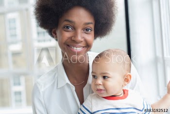 Portrait happy young mother and baby son