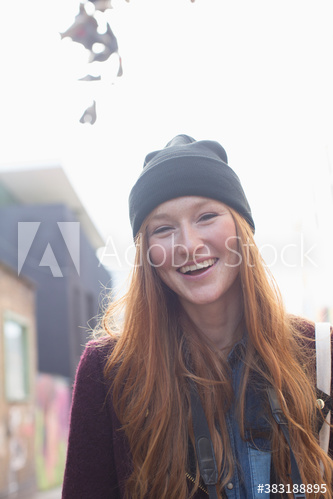 Portrait happy young woman laughing
