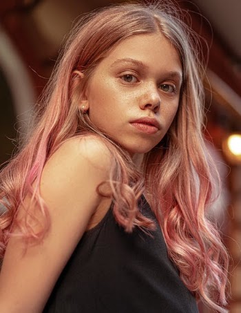 Portrait of a Pretty Woman in Black Top · Free Stock Photo