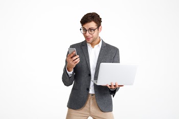 Portrait of a surprised excited businessman Free Photo