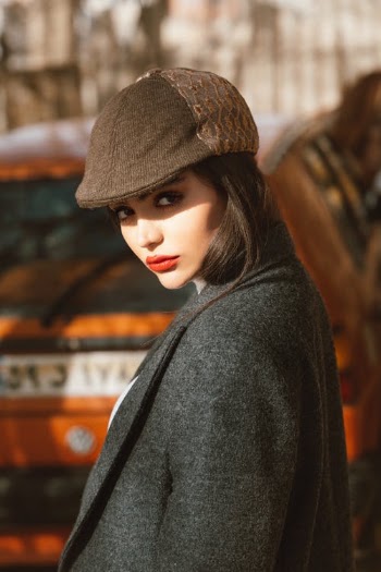 Portrait of a Woman in a Riding Hat  · Free Stock Photo