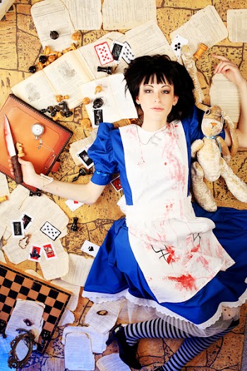 Portrait of a young woman dressed as Alice in Wonderland, video game.