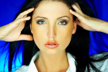 Portrait of beautiful woman wearing white shirt
