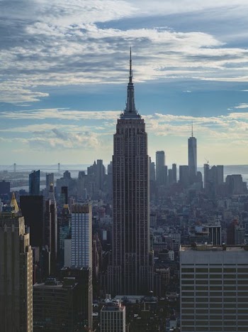 Portrait Of Empire State Building On Cloudy Day