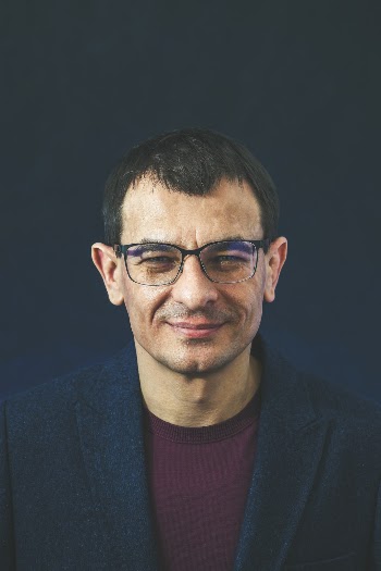 Portrait of man in glasses (scientist)