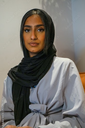 Portrait of Muslim woman at home