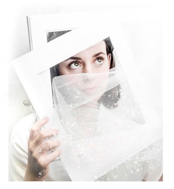 Portrait of Woman Holding White Photo Frame