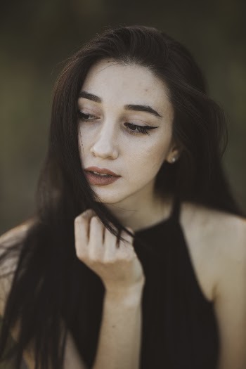 Portrait of Woman Wearing Black Blouse