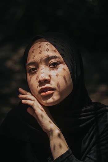 Portrait of Woman Wearing Black Hijab