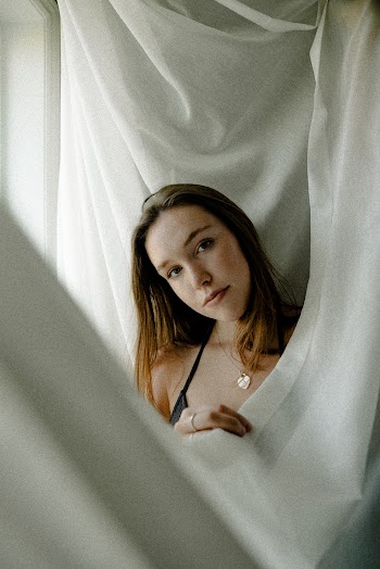Portrait of Woman Wearing Black Spaghetti Strap