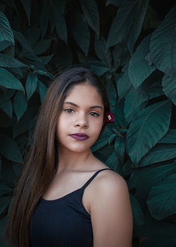 Portrait of Woman Wearing Black Tank Top