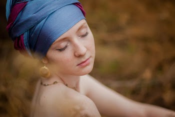 Portrait of Woman Wearing Blue and Maroon Turban