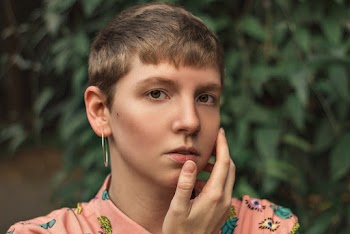 Portrait Of Woman Wearing Pink Top