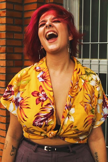 Portrait Of Woman Wearing Yellow Floral Crop Top