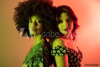 Portrait of young women standing indoors