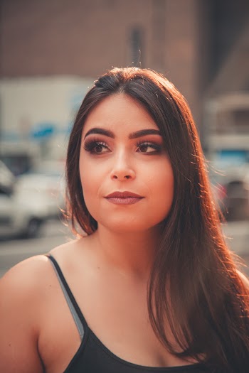 Portrait Photo of Beautiful Woman Looking Away